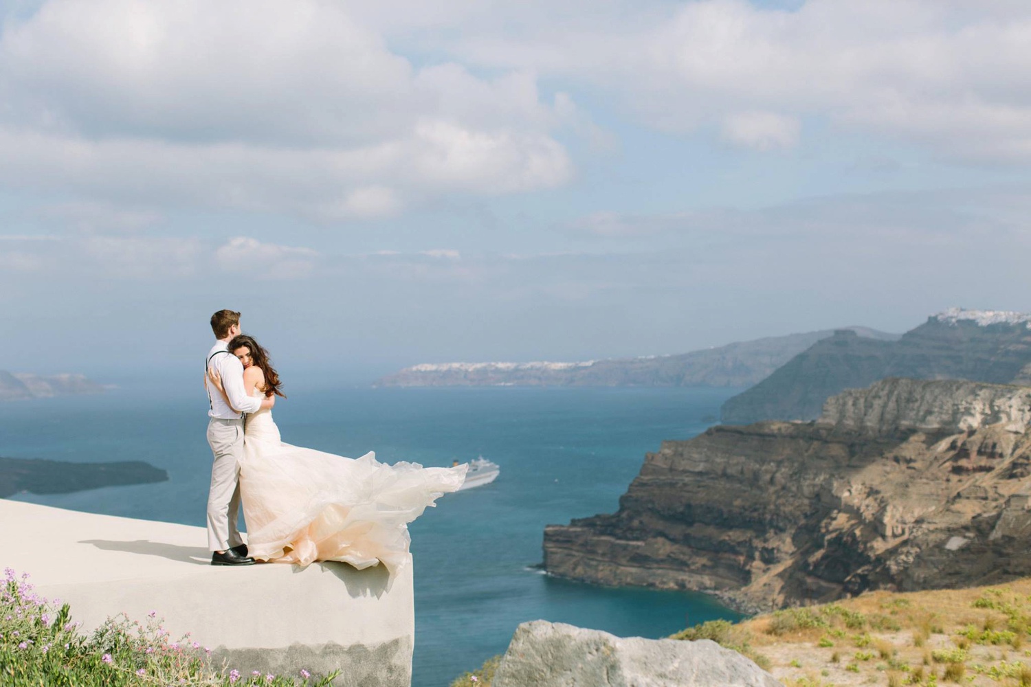 Wedding photo of couple at Santos Wines Winery for their wedding in Santorini, Greece