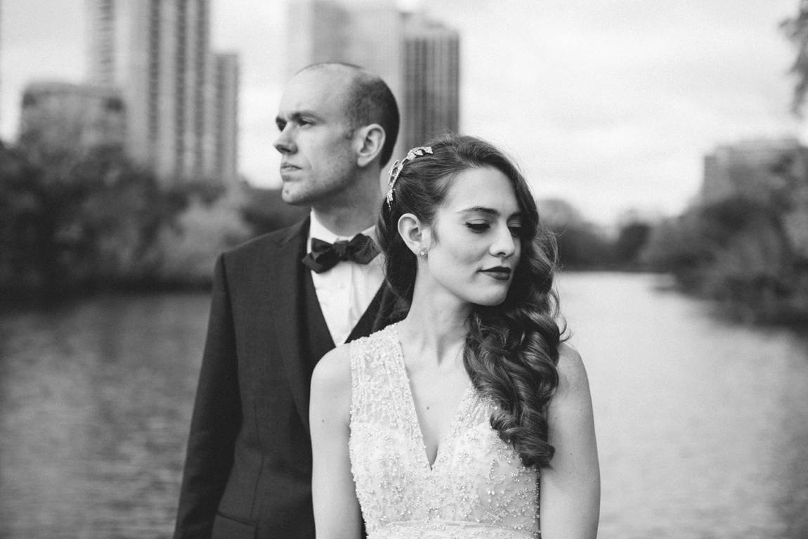 This photo is of a bride and groom standing on the pier in Lincoln Park in Chicago, Illinois